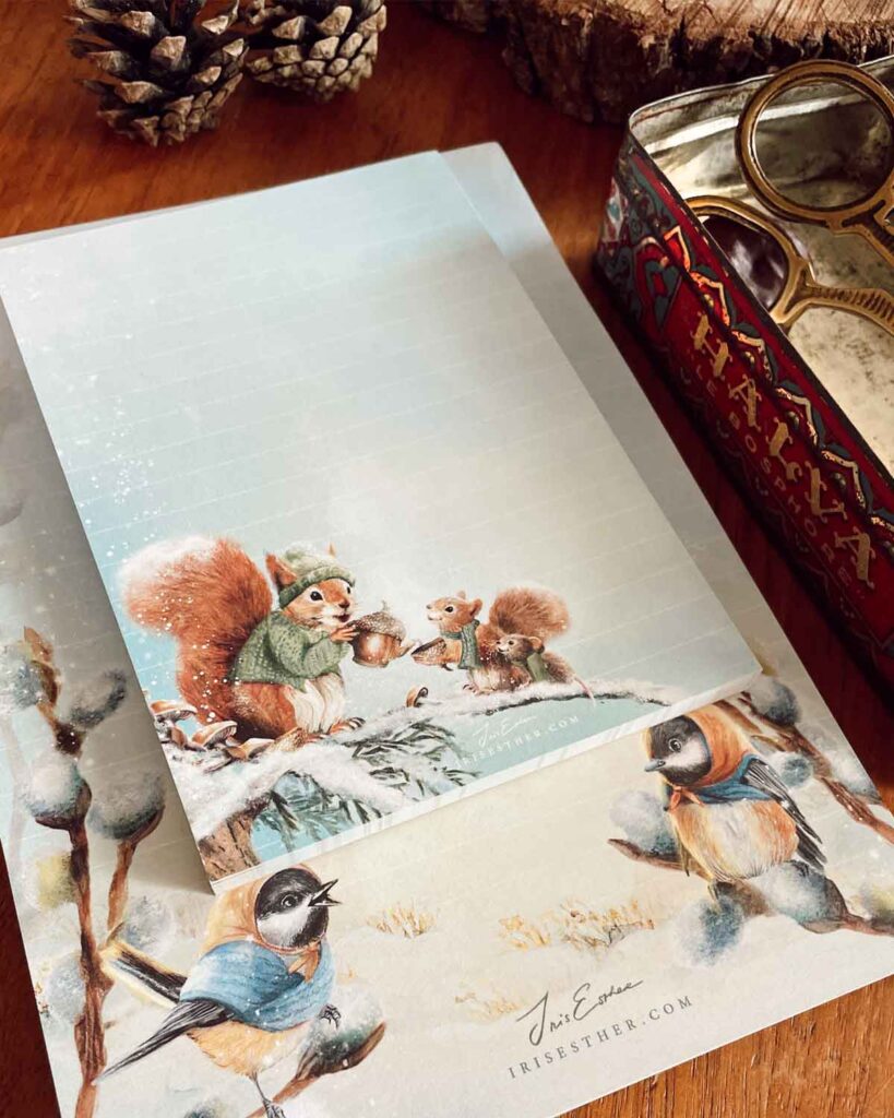 A5 and A6 lined notepads with fairytale-style illustrations of birds in scarves and squirrels serving tea in a snowy forest.