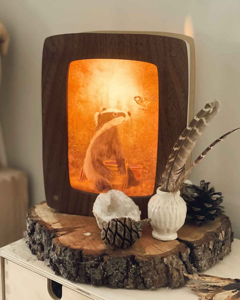 Seasonal postcard lightbox with 4 fairytale illustrations – spring, summer, autumn, and winter stories in one lamp.