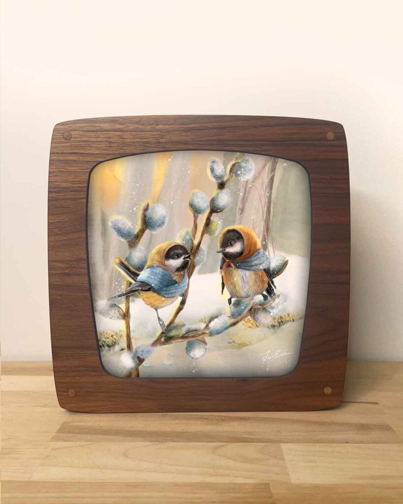 Walnut veneer seasons lamp casting a gentle magical light in the home with an illustration of two birds in snow by iris esther