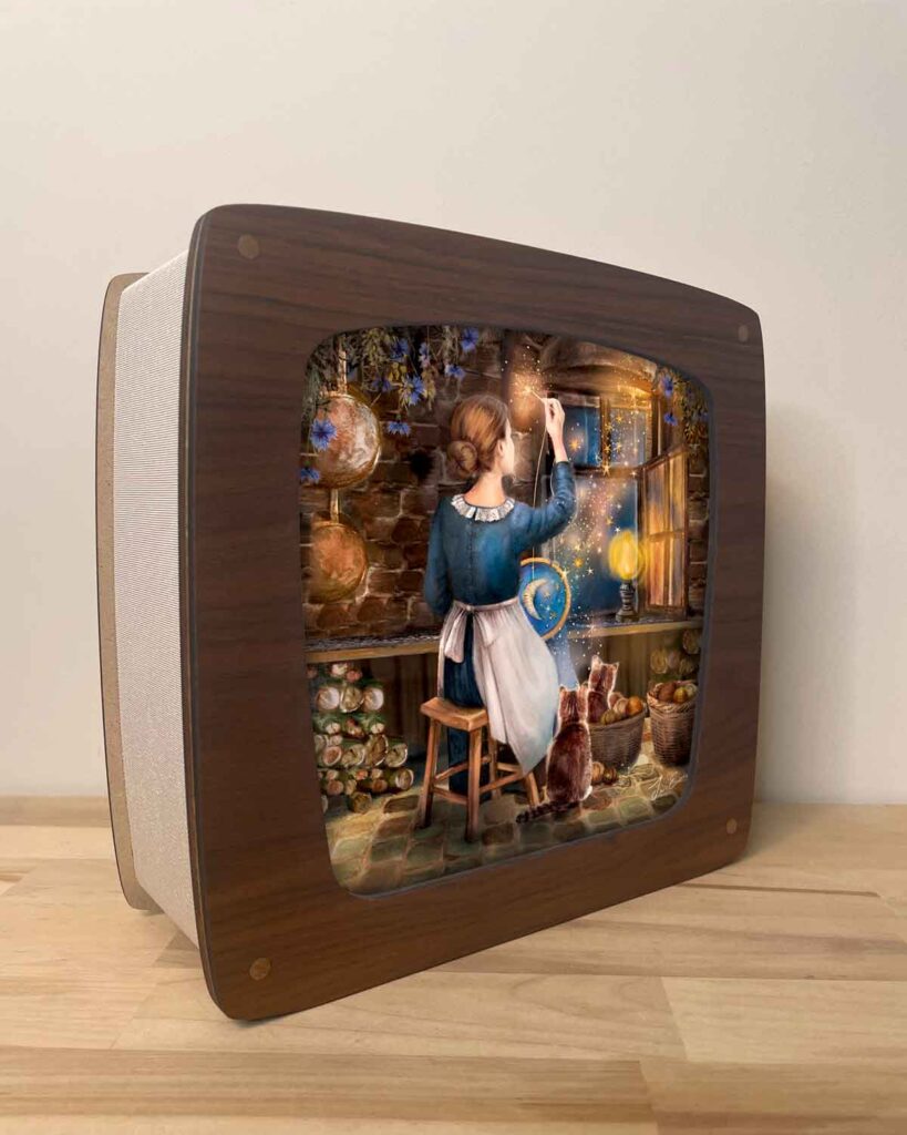 Waldorf seasons lamp featuring softly lit interchangeable illustration sheet of a girl sewing stars by an oil lamp