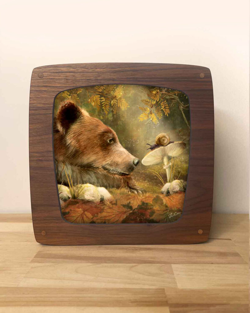 Decorative magic light seasons lamp with natural walnut wood front with an illustration of a bear watching a snail on a toadstool